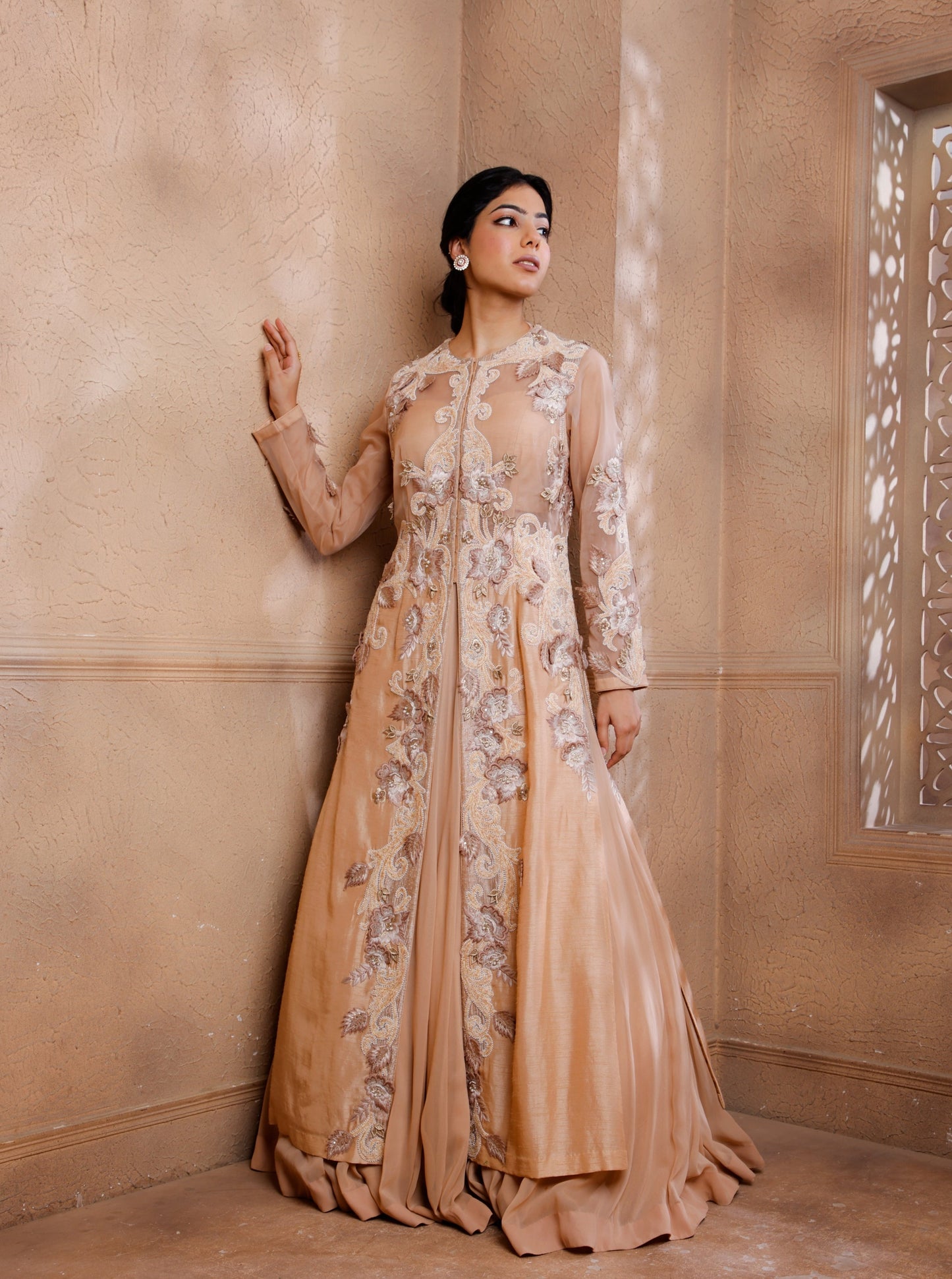 Drape yourself in this opulent jacket lehenga set.