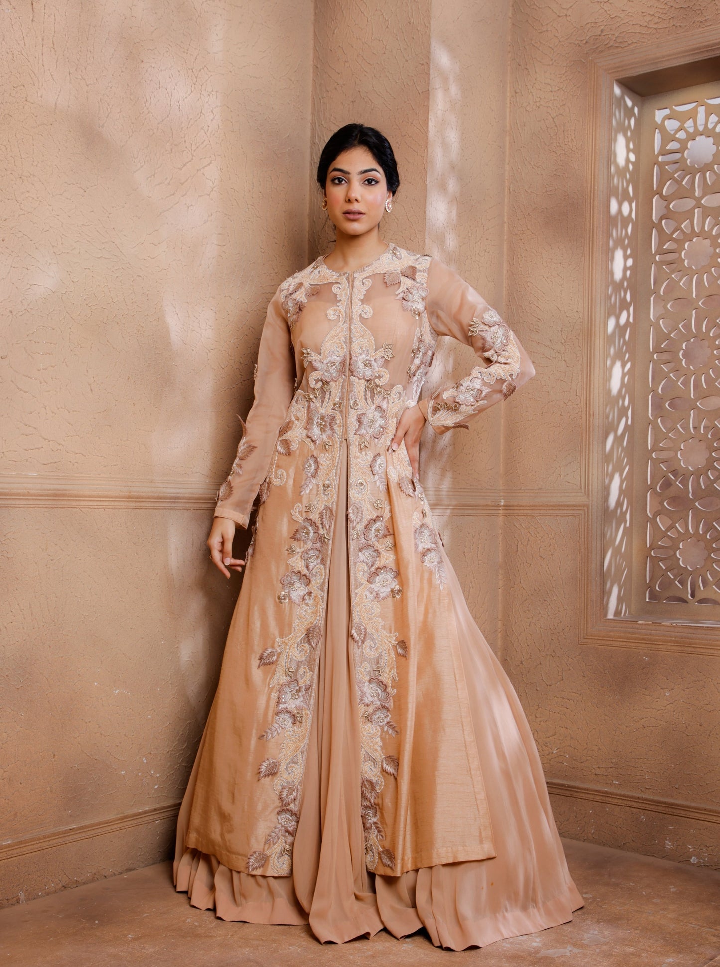 Drape yourself in this opulent jacket lehenga set.