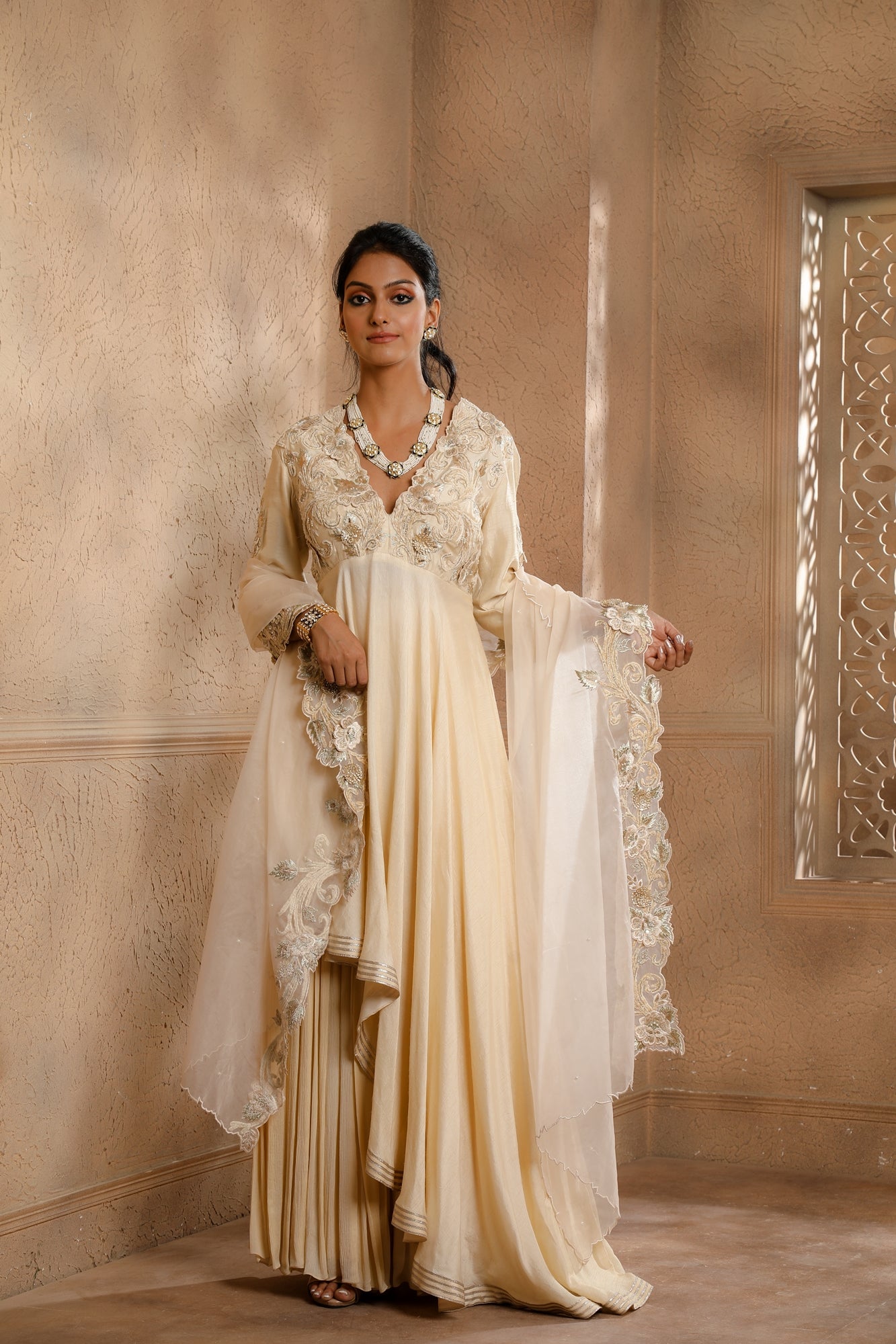 Ivory Asymmetrical Anarkali with Sharara omanabyranjanabothra Ivory Asymmetrical Anarkali with Sharara omanabyranjanabothra