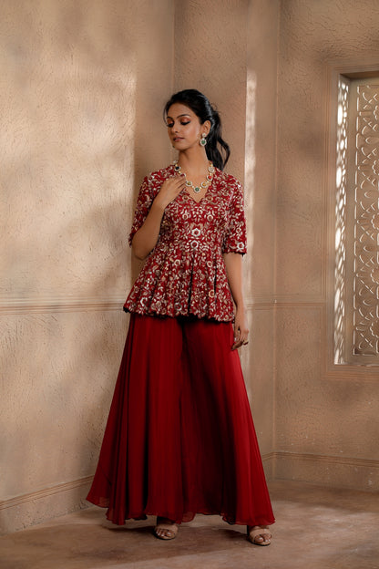 Red Floral Embroidered peplum with contrasting embroidery in hues of gold with an Organza Sharara.