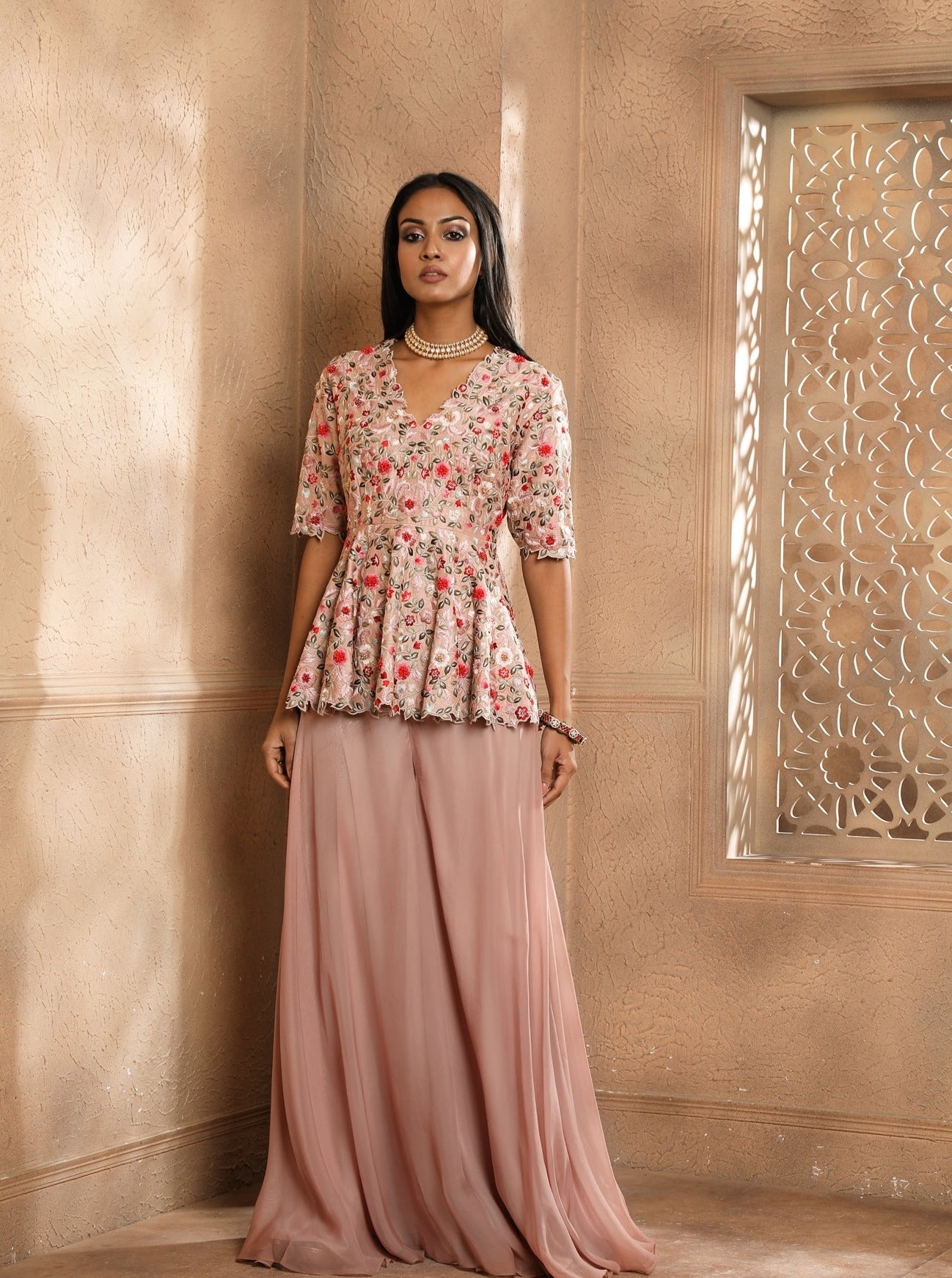 Multicolor Floral Embroidered peplum with an Organza Sharara.