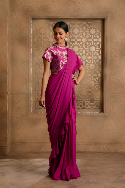 Pre-Draped Georgette Saree with Frill on the Pallu and a High neck Multi-color embroidered blouse with hand embroidery.