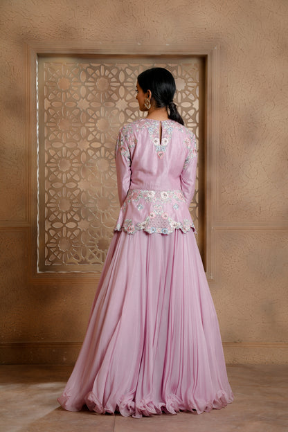Lilac Embroidered Peplum in delicate floral motifs & hand embroidered Jaals paired with a Flared Organza Skirt.