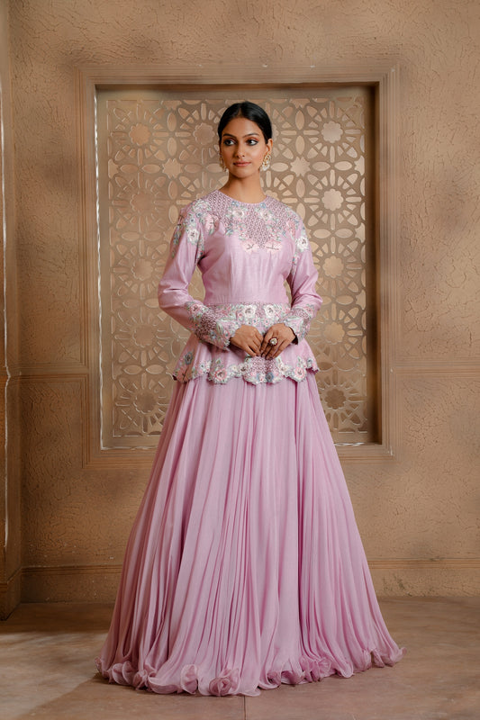 Lilac Embroidered Peplum in delicate floral motifs & hand embroidered Jaals paired with a Flared Organza Skirt.